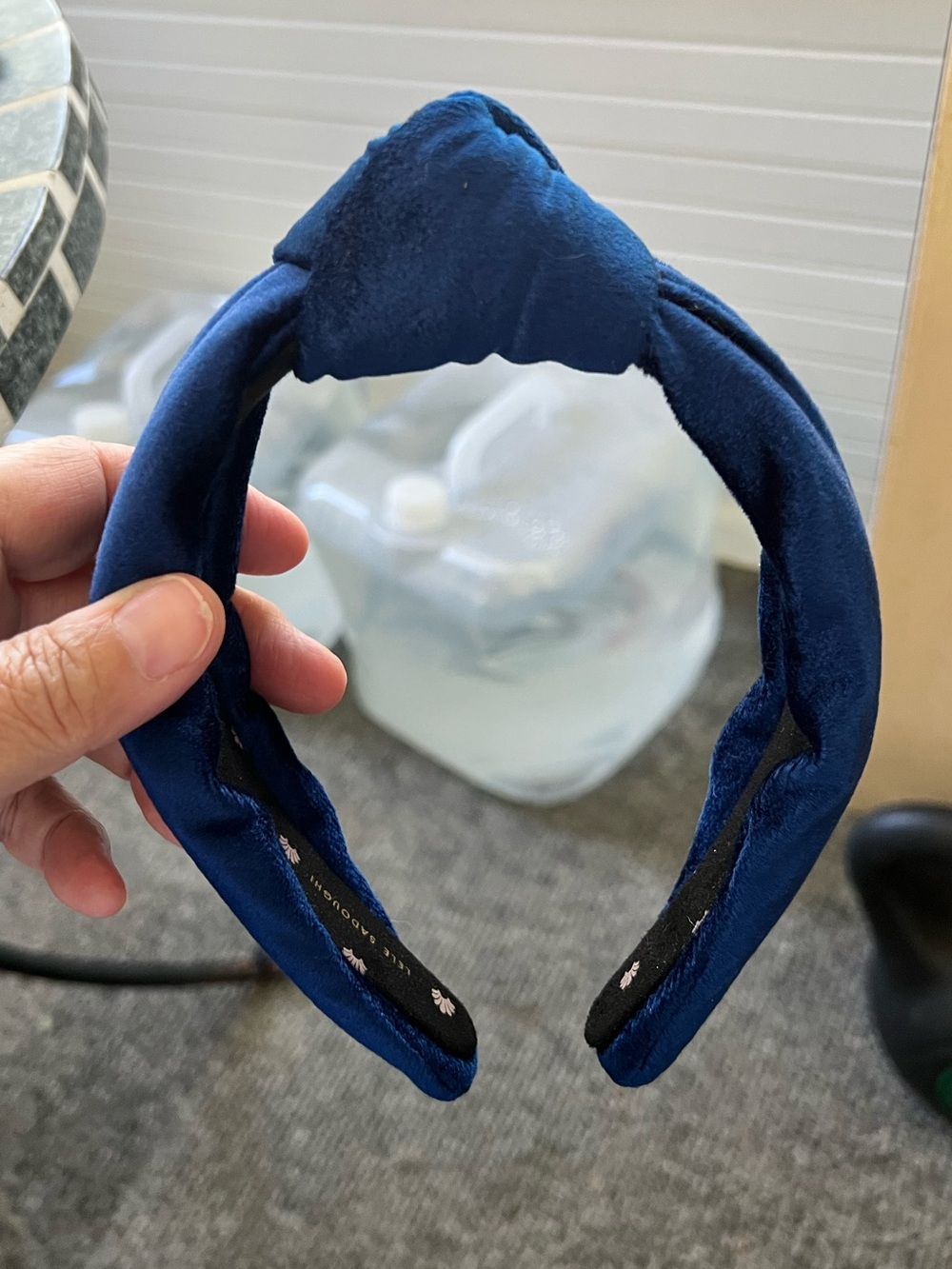 Lele Sadoughi soft navy blue velvet knotted top headband.